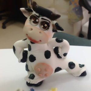 Figurines by Eli Logo