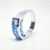 silver ring with blue crystal