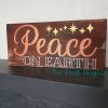 The Craft Heights Peace on Earth wooden sign